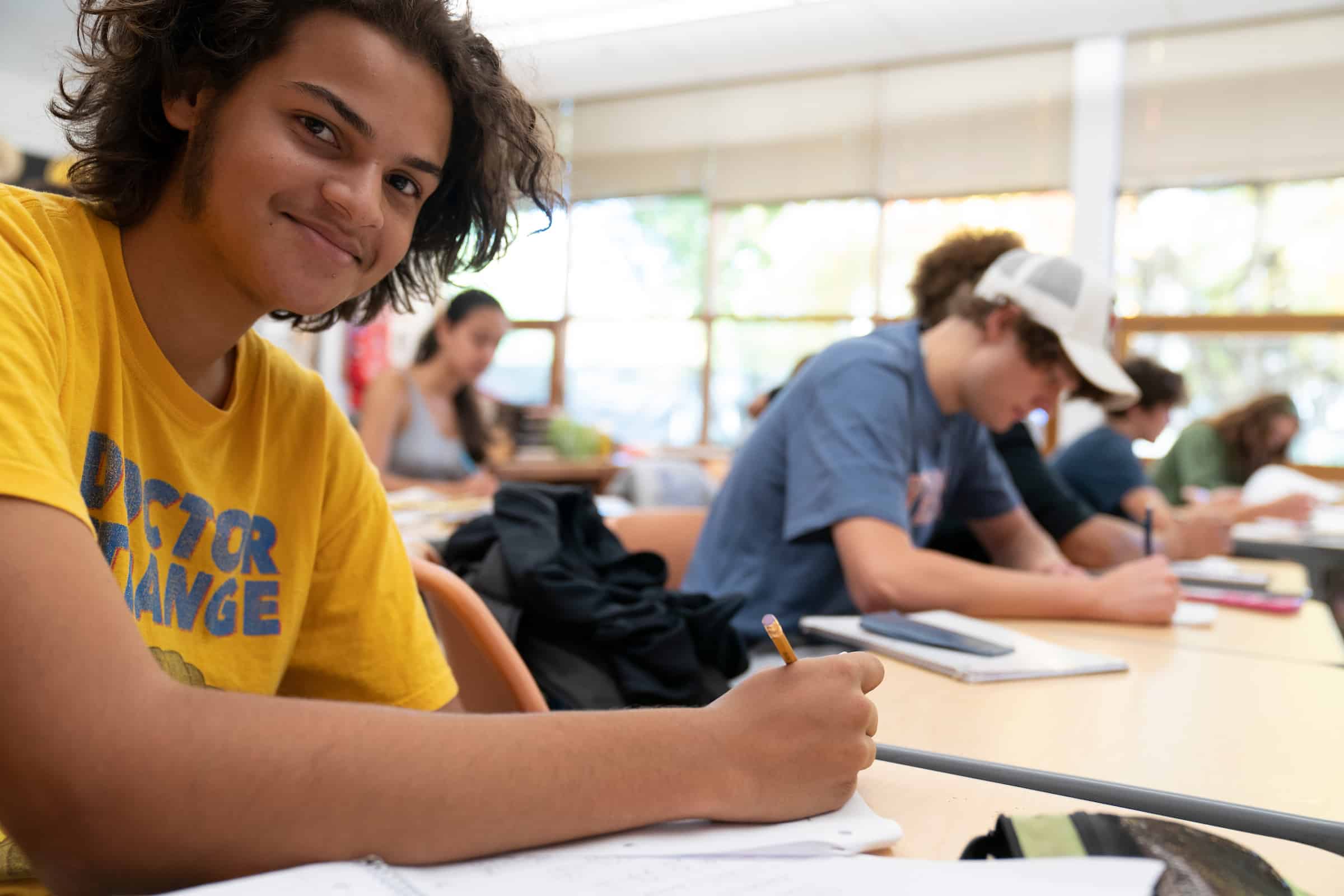 High school student in class.