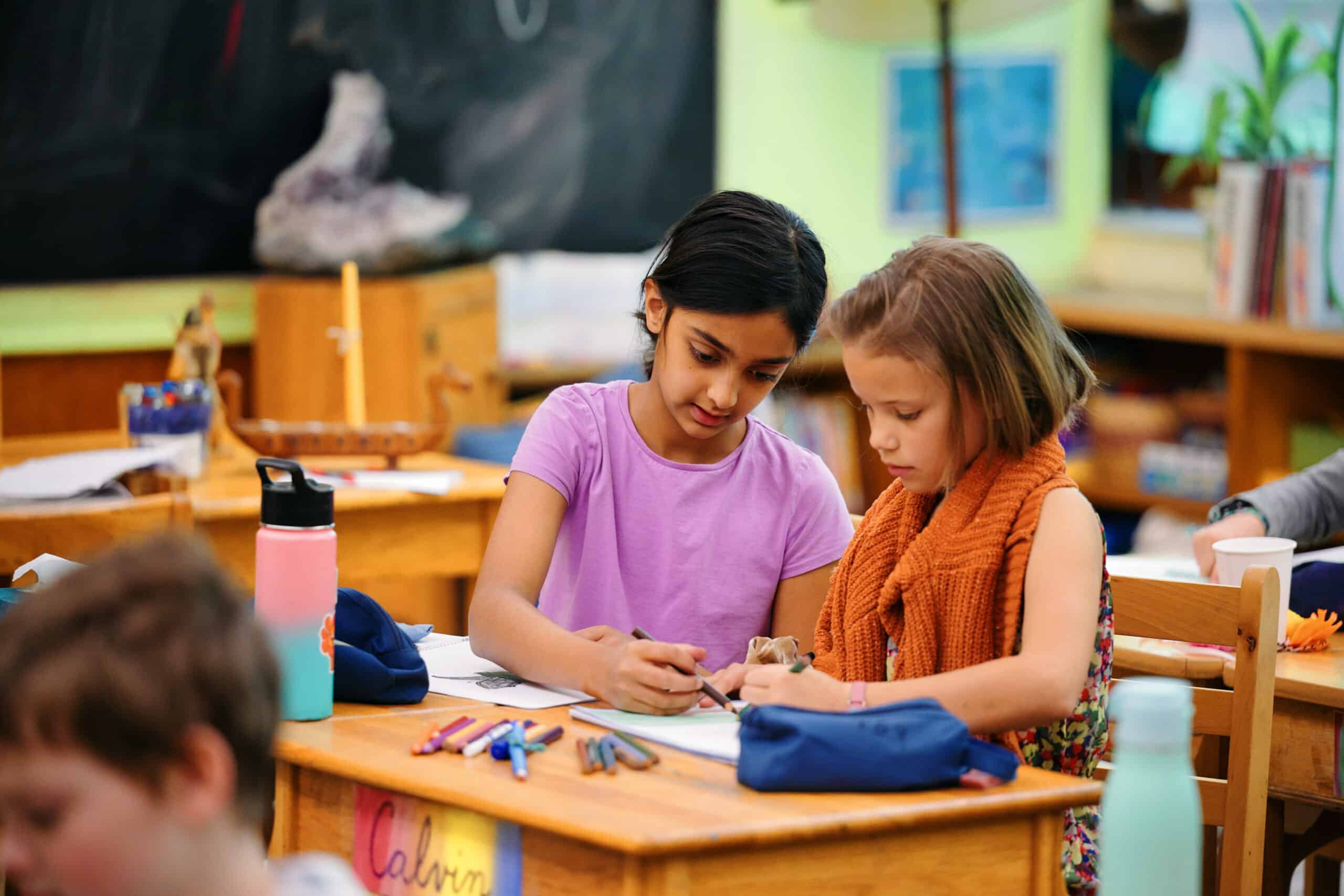 Lower school students working collaboratively.