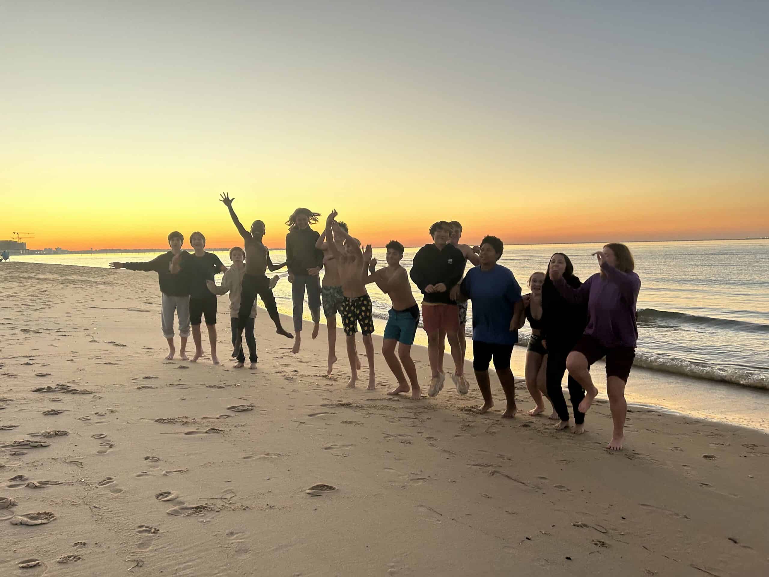 G7-VA-trip-2024-group-beach-scaled image